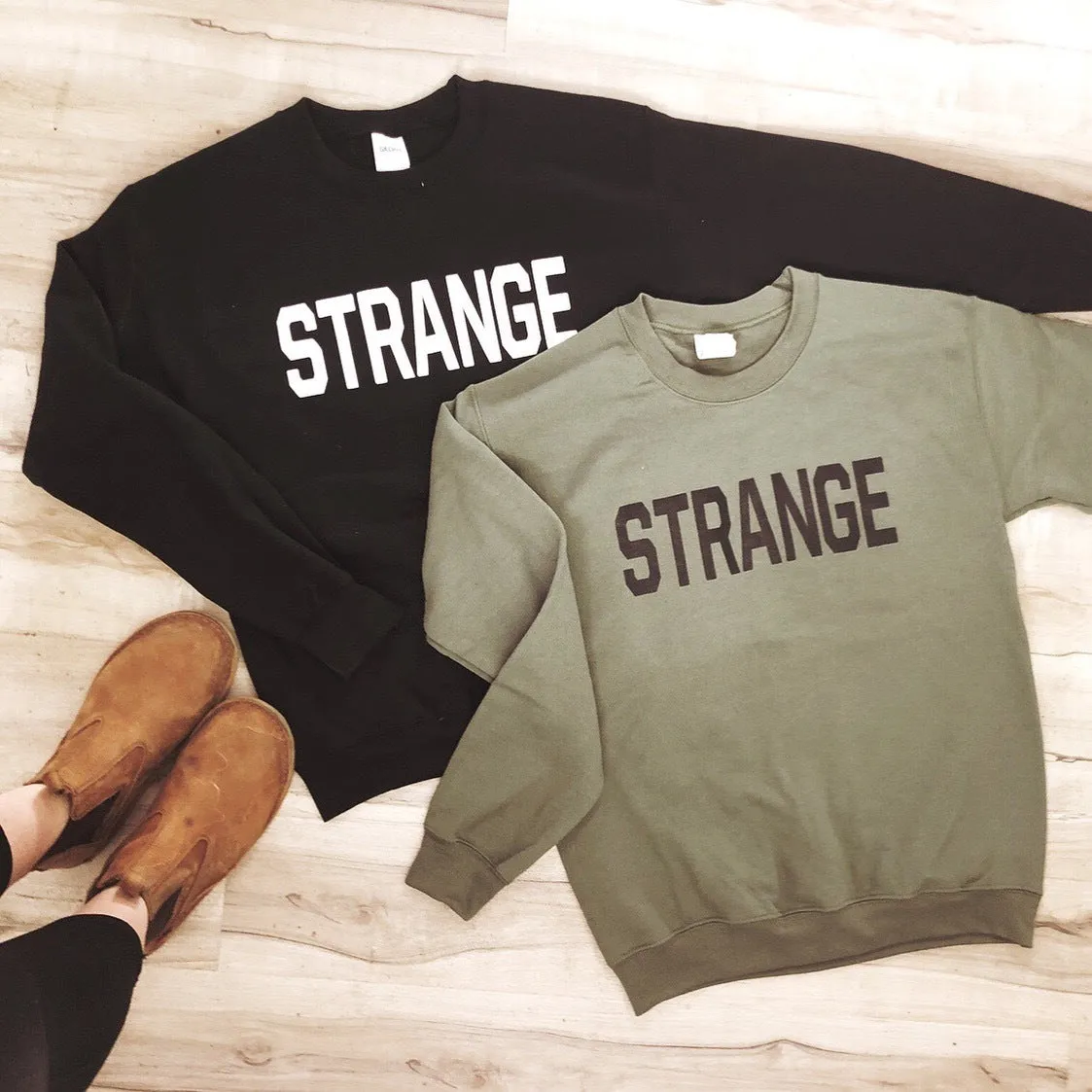 "STRANGE" OG Crewneck Sweatshirts